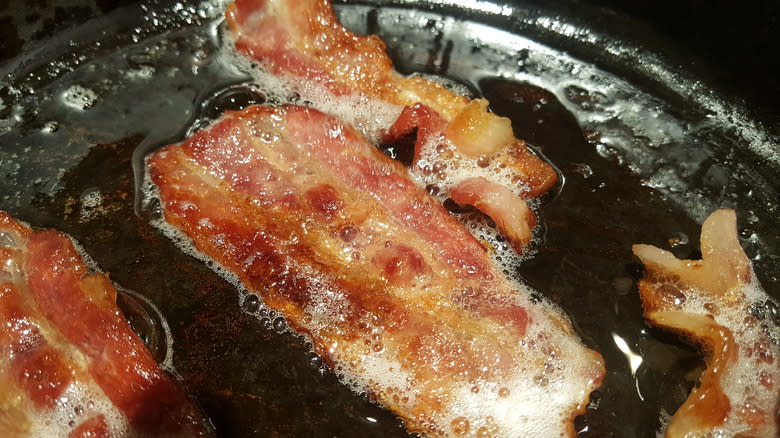 bacon bubbling in grease