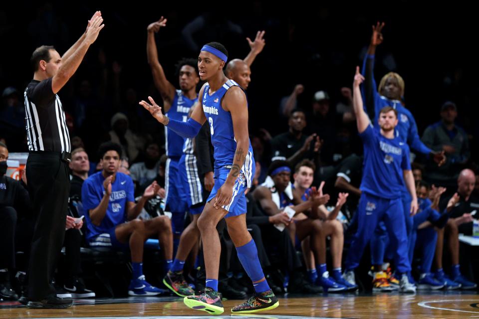 Memphis' Landers Nolley II (3) reacts after making a 3-point basket against Virginia Tech during the second half of an NCAA college basketball game in the NIT Season Tip-Off tournament Wednesday, Nov. 24, 2021, in New York. (AP Photo/Adam Hunger)