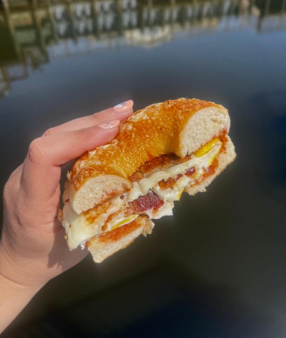 A bacon, egg, hash brown and cheese sandwich on a cheddar bagel from Bagels and Beyond in Beach Haven West.