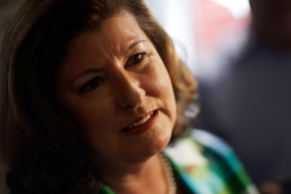 Karen Handel talks to reporters