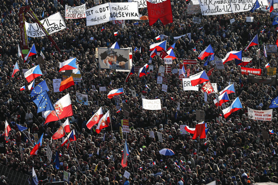 People take part in a large anti-government protest in Prague, Czech Republic, Saturday, Nov. 16, 2019. (AP Photo/Petr David Josek)