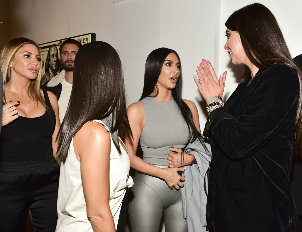 Kim Kardashian was also in attendance wearing silver skintight pants and a grey tank top. Source: Getty