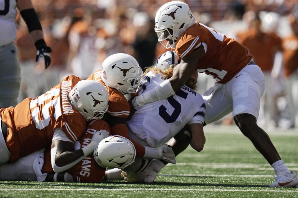 Kansas State quarterback Avery Johnson (5) is stopped for no gain during the first half of an NCAA college football game against Texas in Austin, Texas, Saturday, Nov. 4, 2023. (AP Photo/Eric Gay)