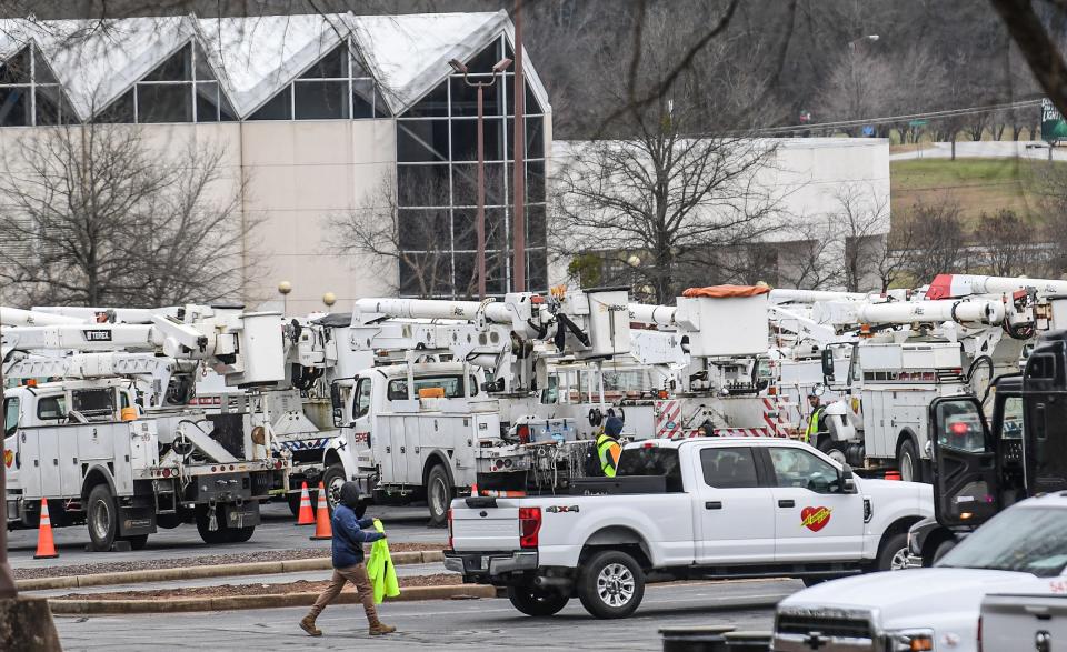 Hundreds of power line workers gather in the parking lot of the Anderson Civic Center Saturday evening January 15, 2022. A winter storm mix is expected for the city of Anderson, with ice and snow at different times. 