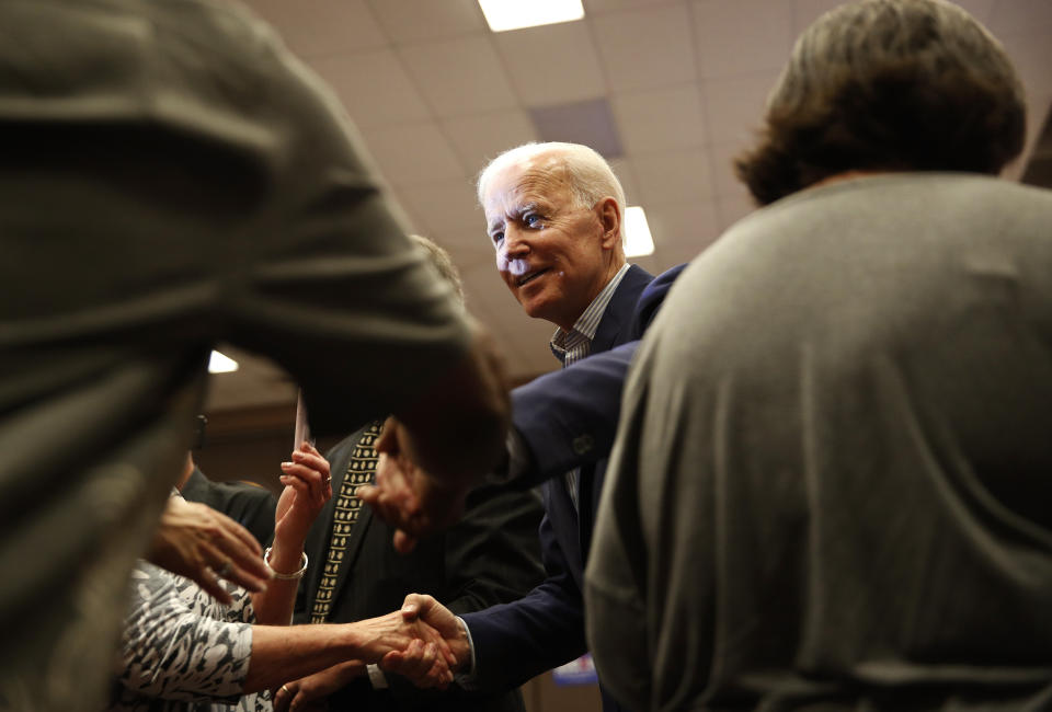 Former vice president and Democratic presidential candidate Joe Biden meets with people after speaking at a rally with members of a painters and construction union, Tuesday, May 7, 2019, in Henderson, Nev. (AP Photo/John Locher)