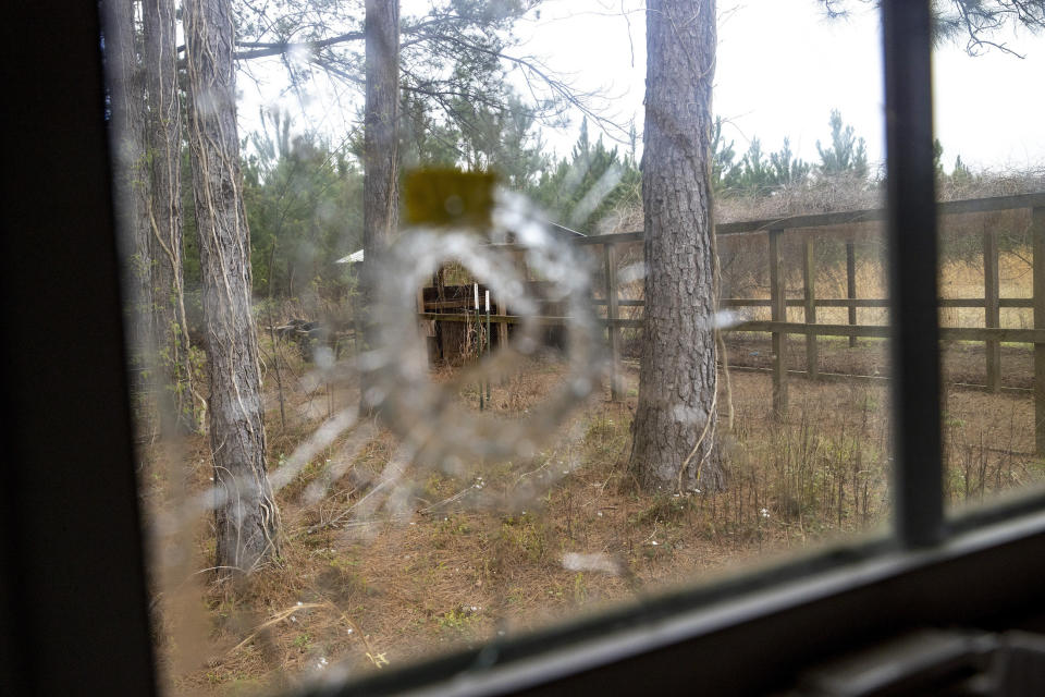 A bullet hole is seen from inside of the feed room at the Moselle Road property on March 1, 2023.