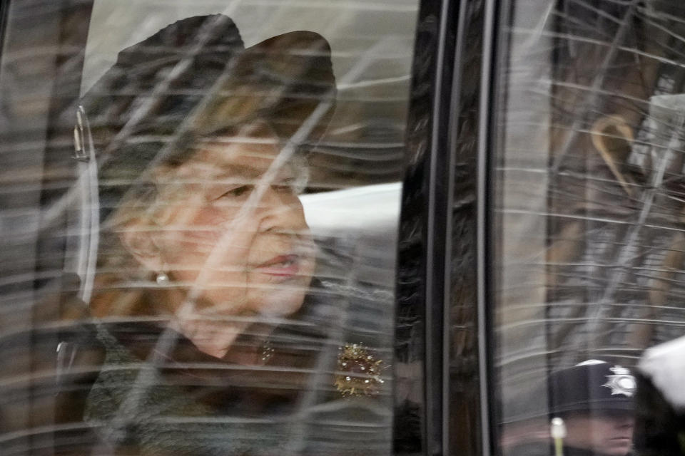 Britain's Queen Elizabeth II is driven in to attend a Service of Thanksgiving for the life of Prince Philip, Duke of Edinburgh at Westminster Abbey in London, Tuesday, March 29, 2022. (AP Photo/Frank Augstein)