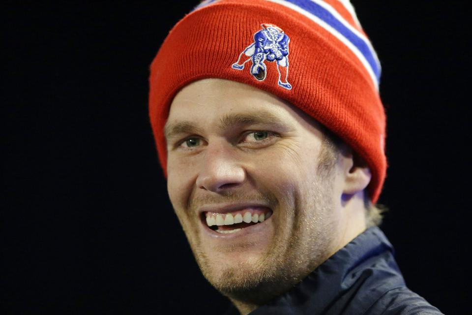 New England Patriots quarterback Tom Brady responds to a reporter's question during a media availability at the NFL football team's facility in Foxborough, Mass., Thursday, Jan. 16, 2014. The Patriots are scheduled to play the Denver Broncos in the AFC championship game on Sunday in Denver. (AP Photo/Stephan Savoia)