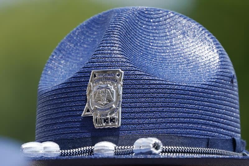 The emblem of a Mississippi Highway Patrol badge on a “cover,” the hat worn by uniformed officers, is shown June 30, 2021, taken at a ceremony in Pearl, Miss. (AP Photo/Rogelio V. Solis, File)