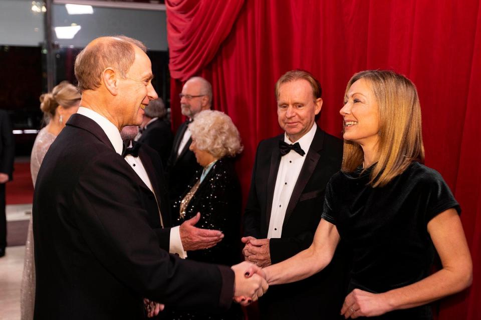 Kevin Lugo (second from right) prepares to meet Prince Edward in December (Getty Images)