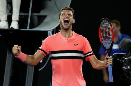 Tennis - Australian Open - Rod Laver Arena, Melbourne, Australia, January 17, 2018. Bulgaria's Grigor Dimitrov celebrates winning his match against Mackenzie McDonald of the U.S. REUTERS/Issei Kato