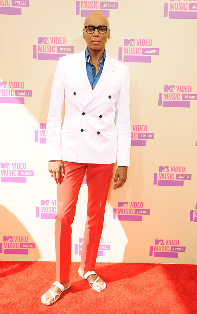 Leaving his wig and stilettos at home, RuPaul hit the VMAs in a crisp blue shirt, white double-breasted blazer, and red pants. Comfy white sandals completed his patriotic ensemble.