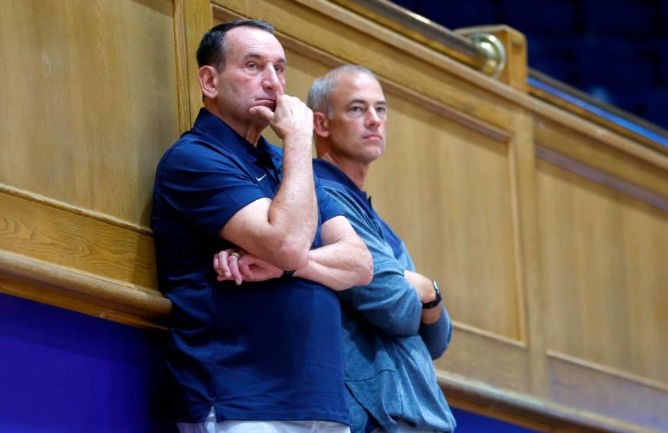 Former Duke head basketball coach Mike Krzyzewski and Mike Schrage, special assistant to the basketball head coach, watch Duke volleyball’s game against East Tennessee State University in the Duke Invitational at Cameron Indoor Stadium in Durham, N.C., Friday, Sept. 2, 2022. Ethan Hyman/ehyman@newsobserver.com