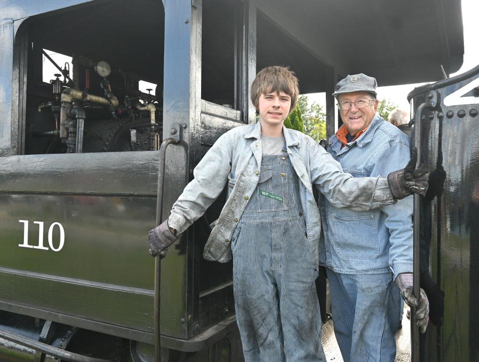 Engineer Terry Bloom with grandson Hudson, training as an engine fireman.