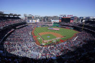 Members of the Atlanta Braves and the Washington Nationals stand on the field during a rendition of the national anthem before an opening day baseball game at Nationals Park, Thursday, March 30, 2023, in Washington. (AP Photo/Alex Brandon)