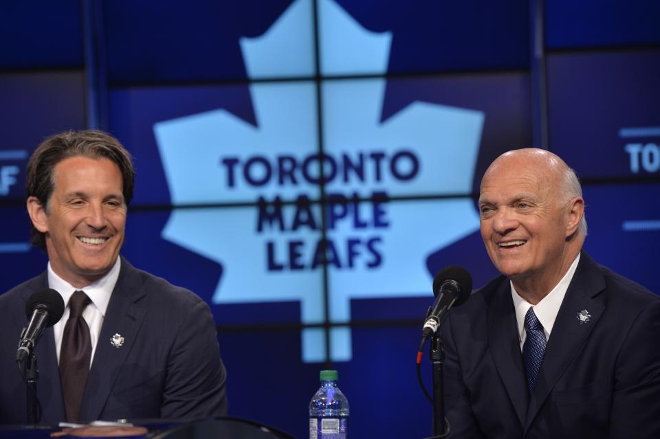 Toronto Maple Leafs President Brendan Shanahan, left, and Lou Lamoriello smile at a news conference to announce Lamoriello has been named the new general manager of the Maple Leafs NHL hockey team in Toronto, Thursday, July 23, 2015. (Galit Rodan/The Canadian Press via AP)