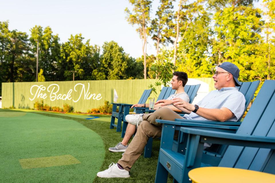 This is Fairway Social. It offers a putting experience, golf swing simulators, food, drinks and more.