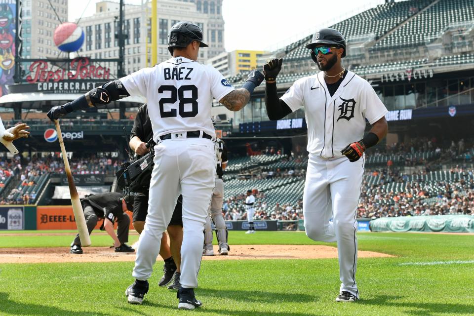 Tigers' Willi Castro, right, is congratulated by Javier Baez after hitting a two-run home run off White Sox starting pitcher Vince Velasquez in the first inning Sunday, Sept. 18, 2022, in Detroit.