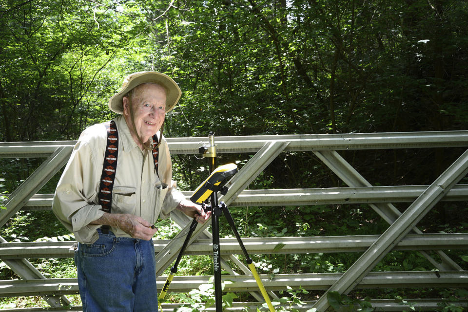 This Aug. 2, 2016 photo provided by Indiana Department of Natural Resources shows Bob Vollmer. Vollmer, 102, who is Indiana's oldest state employee is retiring after nearly six decades on the job, saying that “your body tells you when it's time to go.” Vollmer plans to report to work for the last time Feb. 6, 2020, as a surveyor for the Indiana Department of Natural Resources. The southern Indiana man, whose mother lived to be 108, joined the state agency in 1962. (John Maxwell/ Indiana Department of Natural Resources via AP)