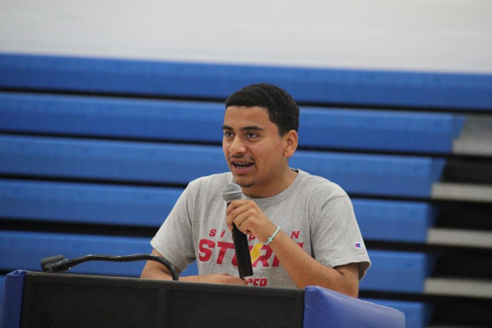 Jonathan Barrios-Munoz speaks during a celebratory signing day on Monday, May 6, 2024, in the Perry High School gym.