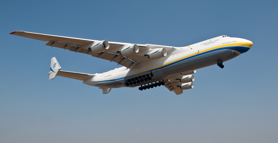 <p>Built to carry Soviet space vehicles, the Mriya was the <a href="https://www.businessinsider.com/antonov-an-225-mriya-worlds-largest-cargo-plane-history-details-2020-4" rel="nofollow noopener" target="_blank" data-ylk="slk:largest aircraft in the world;elm:context_link;itc:0;sec:content-canvas" class="link ">largest aircraft in the world</a> when it first took to the skies in 1988. Sporting 32 wheels and six turbofan engines, the An-225 is still hauling up to 550,000 pounds of cargo per flight. Recently, the Mriya transported a huge load of COVID-19 medical supplies from China to Europe. </p>