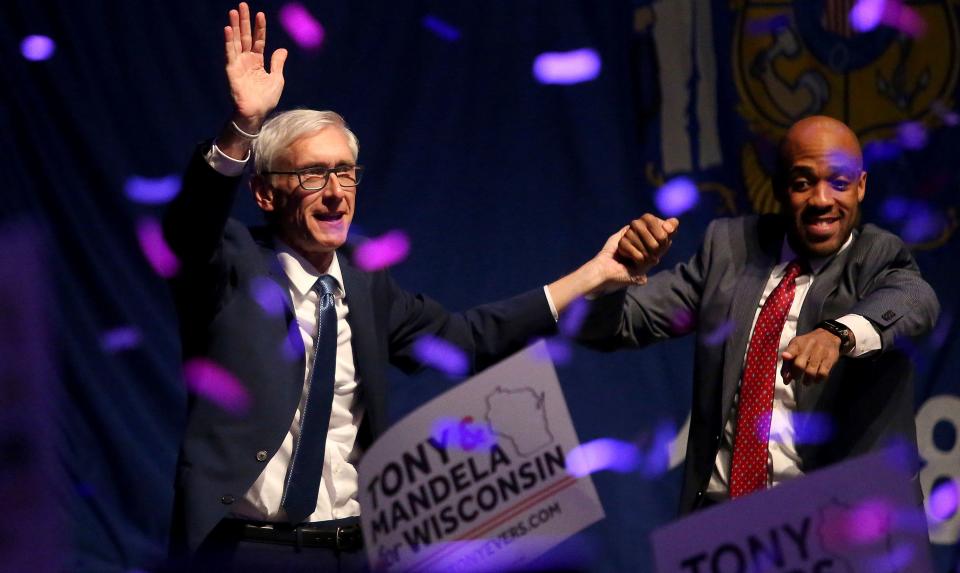 Evers, left, defeated Walker in the race for governor.&nbsp; (Photo: ASSOCIATED PRESS)