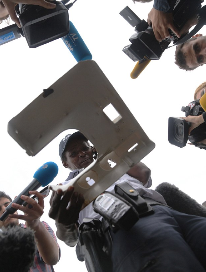 A plastic object has investigators questioning whether it's a plane window. Photo: Getty Images/AFP