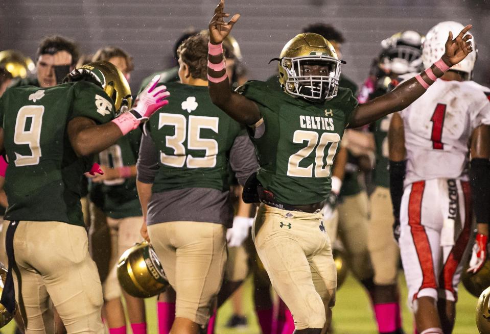 Trinity Catholic's Kyrion Weathers (20) celebrates after the Celtics defeated Victory Christian Storm 26-23 on Oct. 18 in Ocala.
