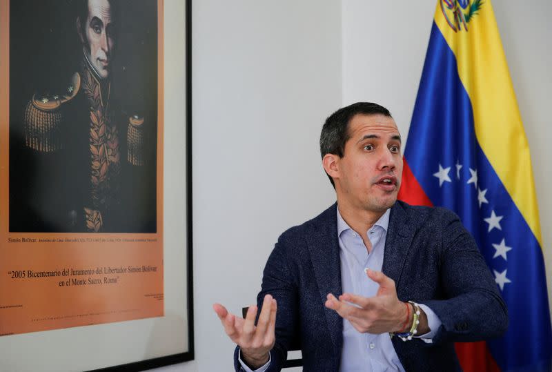 Venezuelan opposition leader Juan Guaido speaks during an interview with Reuters