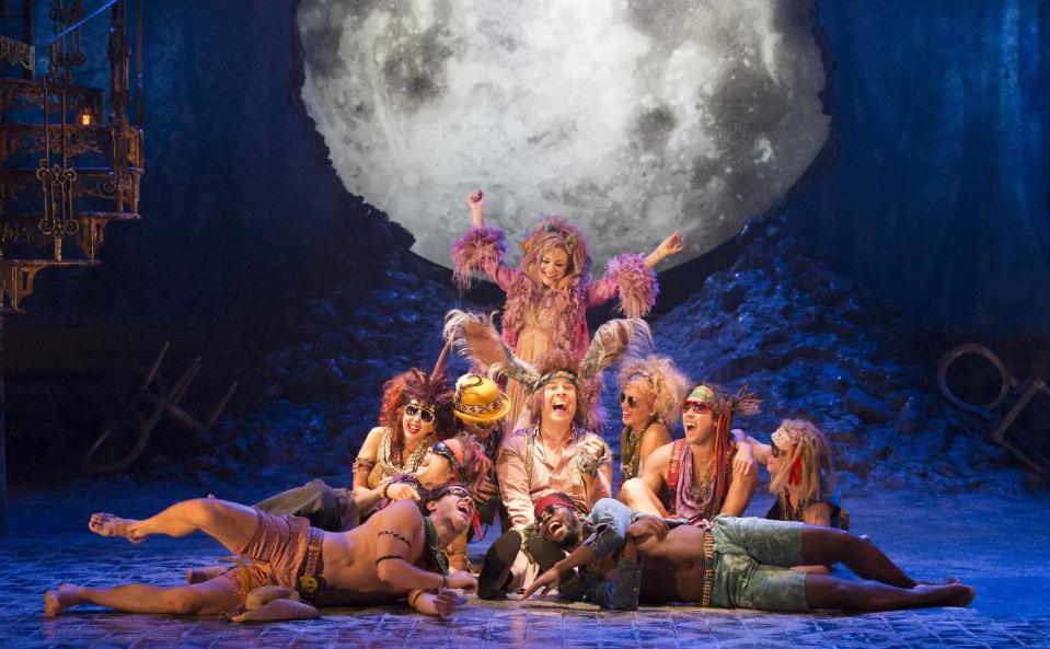 This image released by Johan Persson on Friday Sept. 20, 2013 shows Sheridan Smith, top, David Walliams, center, and the company during the production of William Shakespeare's 'A Midsummer Night’s Dream' at the Noel Coward Theatre in London. 'A Midsummer Night's Dream,' directed by Michael Grandage, aims to attract young theatergoers with a fast-paced production of the magical comedy starring two small-screen stars: actress Sheridan Smith and David Walliams. (AP Photo/Johan Persson)