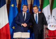 Macron recently signed a new bilateral cooperation treaty with Italy's Prime Minister Mario Draghi (AFP/Domenico Stinellis)