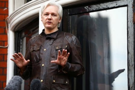 FILE PHOTO: WikiLeaks founder Julian Assange is seen on the balcony of the Ecuadorian Embassy in London, Britain, May 19, 2017. REUTERS/Neil Hall