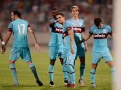 Football - Birkikara v West Ham United - UEFA Europa League Second Qualifying Round Second Leg - Ta' Qali National Stadium, Malta - 23/7/15 West Ham's Diego Poyet celebrates with team mates after scoring the winning penalty in the shootout Mandatory Credit: Action Images / Alan Walter Livepic EDITORIAL USE ONLY.