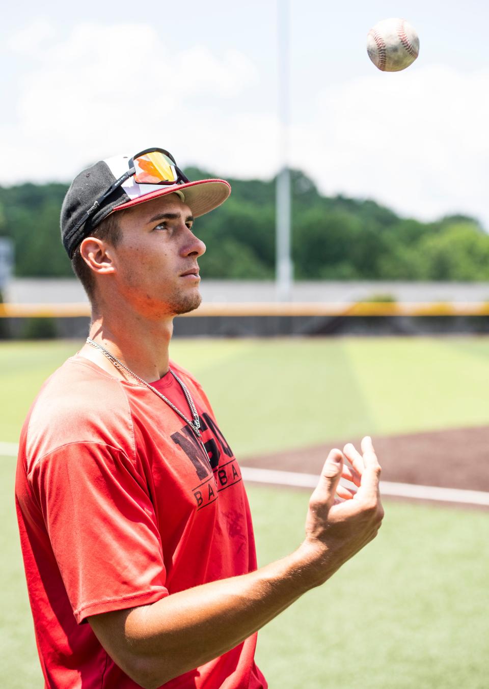 North Greenville outfielder Marek Chlup takes a brief break during practice on Wednesday, June 2, 2022 as the Crusaders prepare for the Division II College World Series.