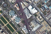 This March 24, 2018 satellite image provided by DigitalGlobe shows crowds at the "March for Our Lives" demonstration in Washington. (DigitalGlobe, a Maxar company via AP)