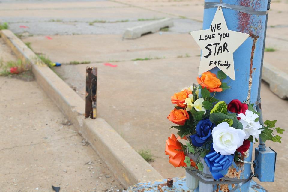 A memorial for Star Shells was placed on the side of Martin Luther King Avenue following a 2021 fatal car crash that took the lives of Shells and her unborn baby.