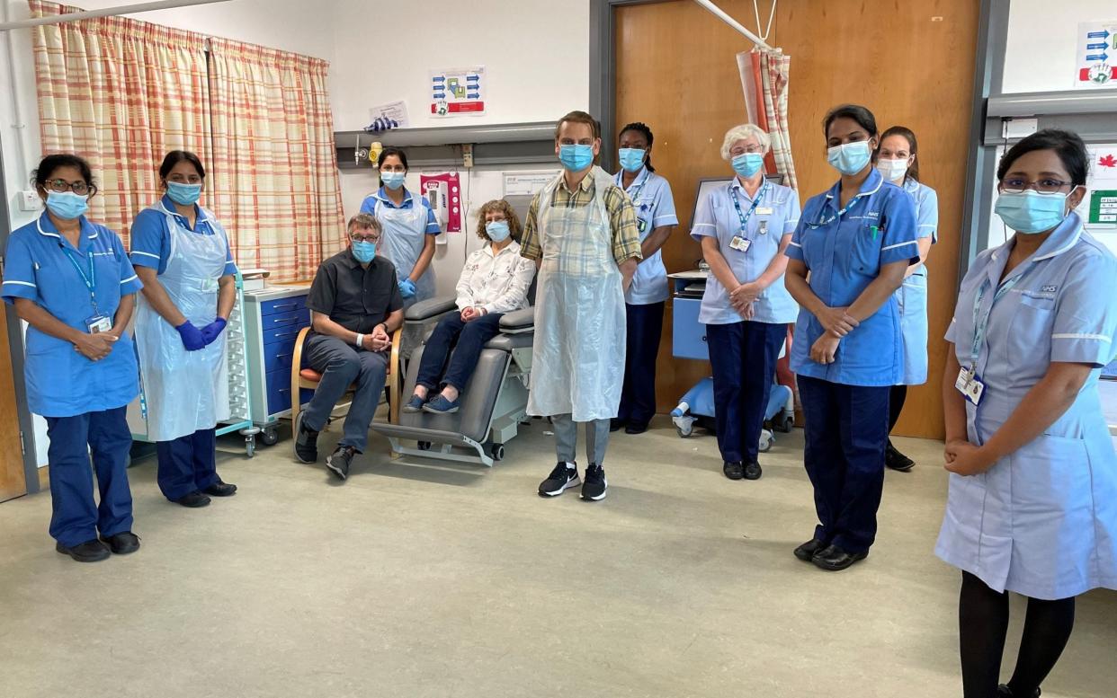 Andrew and Helen Clarke with the clinical trials team in Manchester - PA/University of Manchester