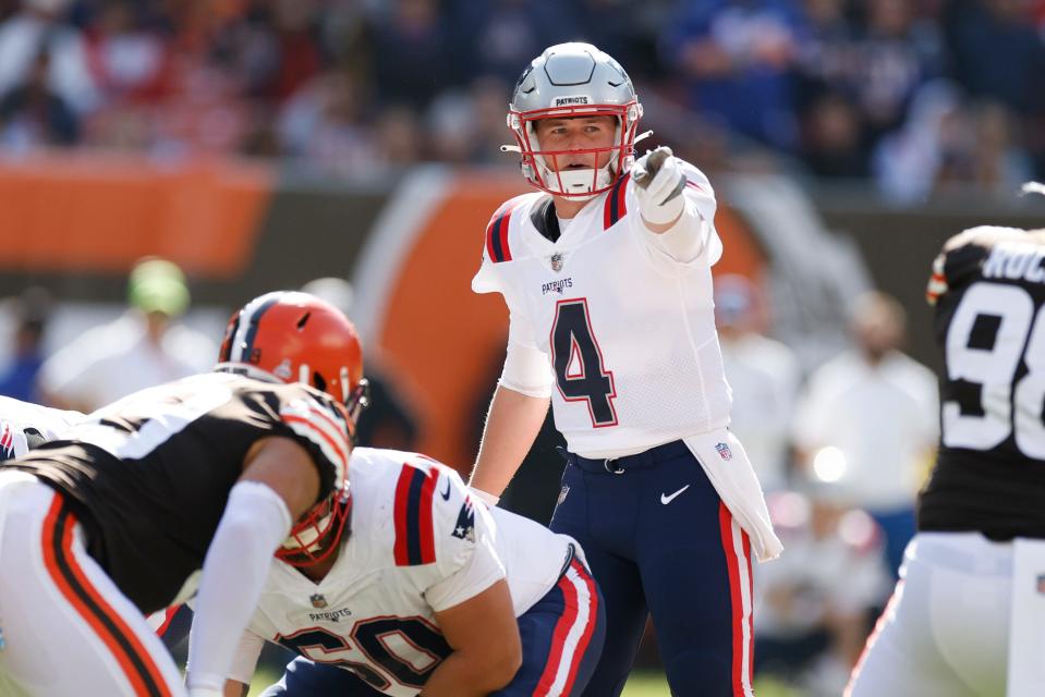 New England Patriots quarterback Bailey Zappe calls signals against the Browns during the first half, Sunday, Oct. 16, 2022, in Cleveland.