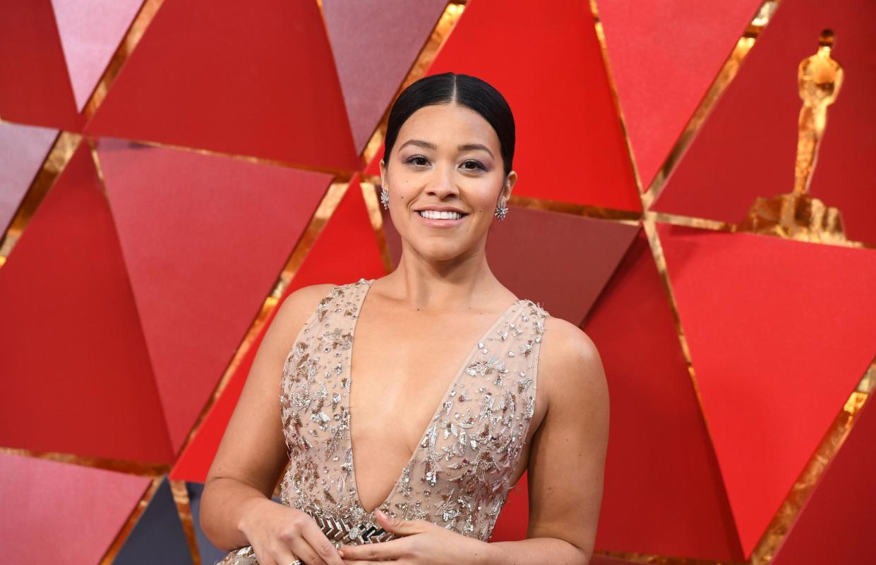 Actress Gina Rodriguez is using her Emmy campaign money to fund an undocumented student's college scholarship: ANGELA WEISS/AFP/Getty Images