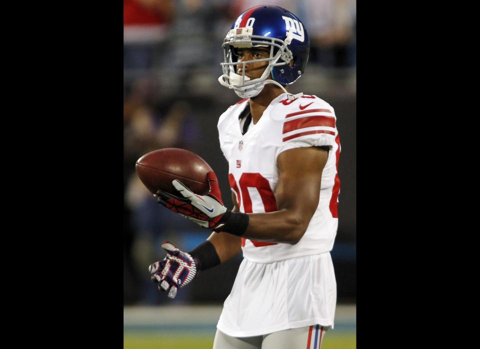 New York Giants wide receiver Victor Cruz (80) warms up before an NFL football game against the Carolina Panthers in Charlotte, N.C., Thursday, Sept. 20, 2012. 