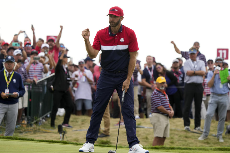 Team USA's Dustin Johnson reacts to his putt on the 15th hole during a Ryder Cup singles match at the Whistling Straits Golf Course Sunday, Sept. 26, 2021, in Sheboygan, Wis. (AP Photo/Charlie Neibergall)