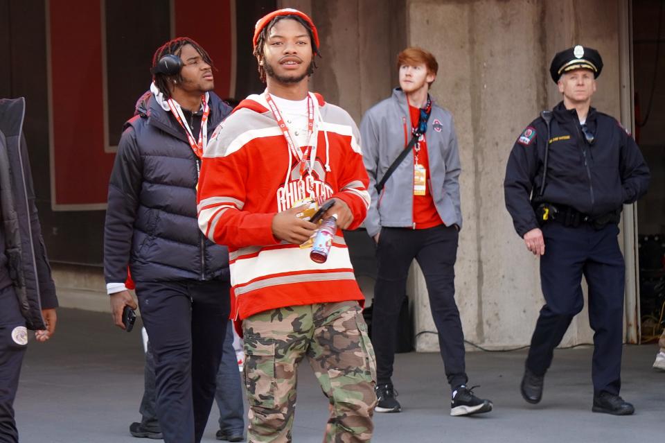 Recruit Blake Woodby watches Ohio State warm up before playing Penn State Oct. 21, 2023 at Ohio Stadium.