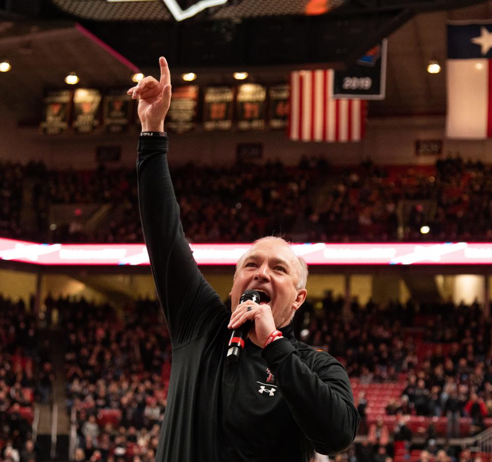 Texas Tech football head coach Joey McGuire leads the Raider Power chant before the game on Tuesday, Feb. 1, 2022, at United Supermarkets Arena in Lubbock, Texas.