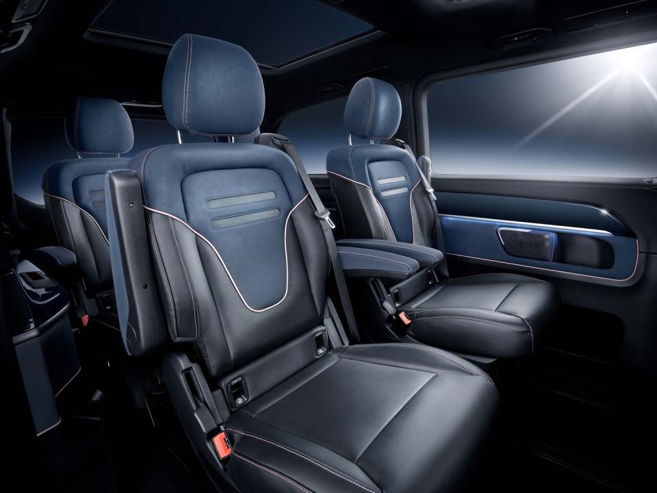 <p>Dark-blue upholstery with rose-gold-colored stitching covers the seats and dash top, while matching trim throughout the cabin ties the interior together.</p>