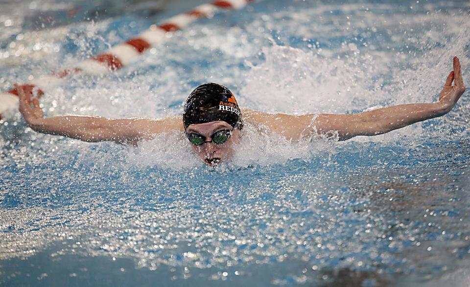 Justin Dostal from Anderson High School, shown competing in the 100-yard butterfly, will swim in multiple events in 2022-2023.