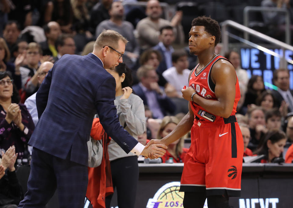 多倫多暴龍總教練Nick Nurse與Kyle Lowry。（Photo by Tom Szczerbowski/Getty Images）