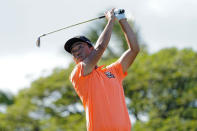 Kevin Na plays his shot from the 11th tee during the first round of the Sony Open golf tournament, Thursday, Jan. 13, 2022, at Waialae Country Club in Honolulu. (AP Photo/Matt York)