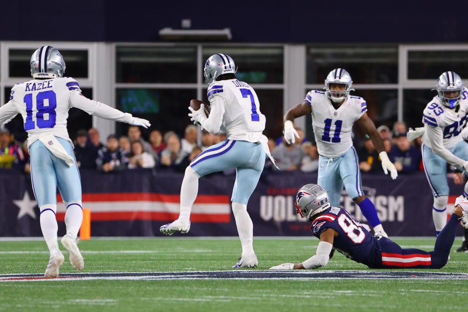 Dallas Cowboys cornerback Trevon Diggs intercepts a pass and scores a touchdown in the NFL game against the New England Patriots.