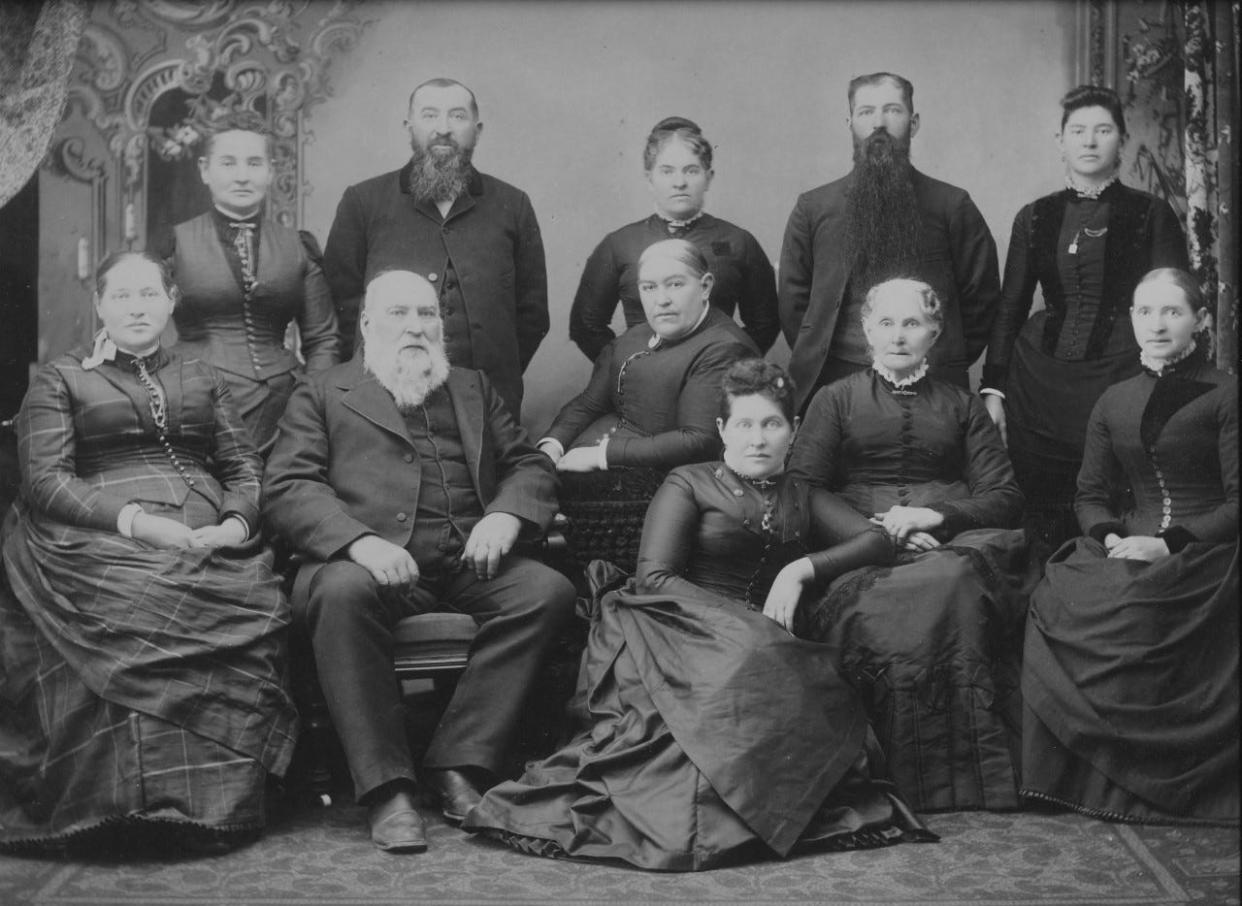 Robert H. and Mary Peters Herkimer are shown in a family portrait with some of their 11 children. The Herkimer family ran successful mills, farms and businesses in Monroe County and surrounding areas beginning in the 1830s.