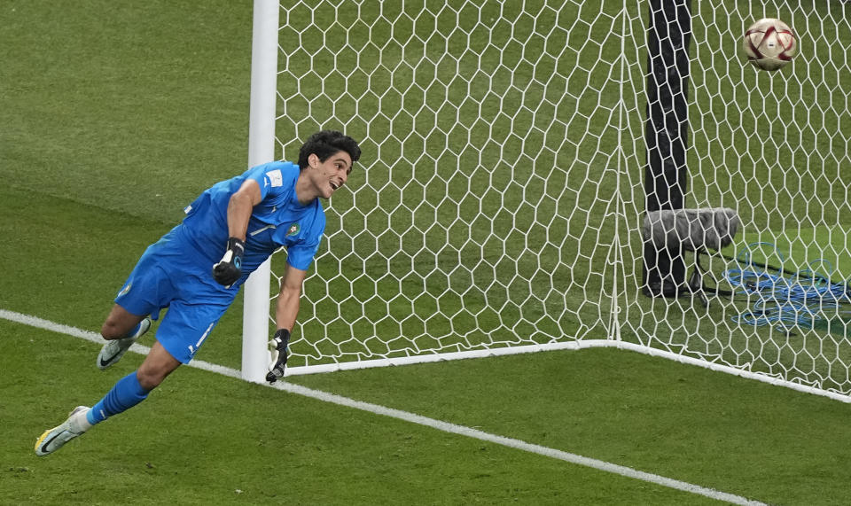 Morocco's goalkeeper Yassine Bounou fails to save the goal from Croatia's Mislav Orsic during the World Cup third-place playoff soccer match between Croatia and Morocco at Khalifa International Stadium in Doha, Qatar, Saturday, Dec. 17, 2022. (AP Photo/Martin Meissner)